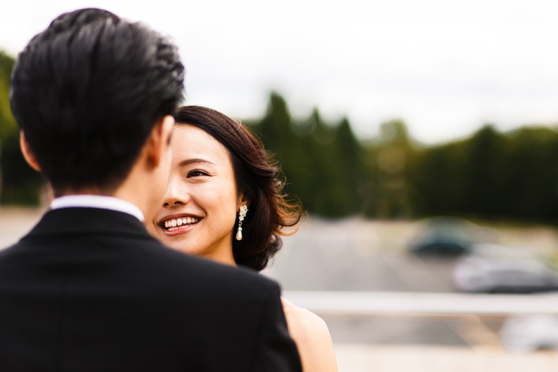 Bride smiles at her husband