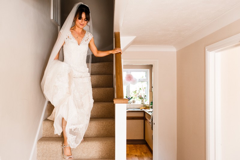 Bride walking down the stairs 