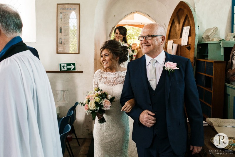 Bride and her dad walking down the aisle