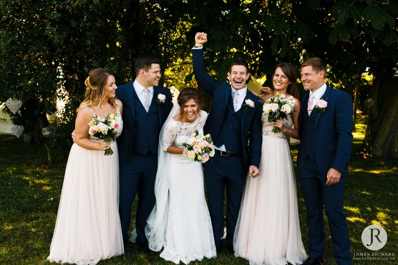 group photo of bridal bart laughing and smilling