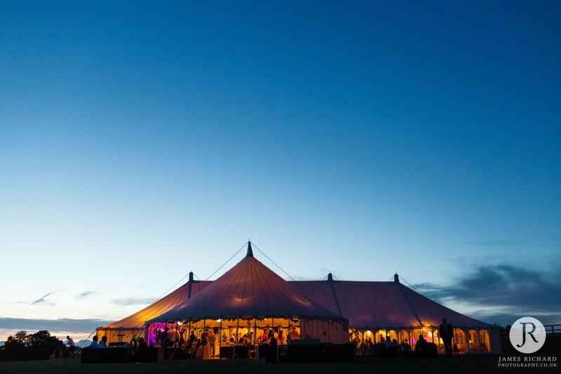 Marquee wedding venue in Essex lit up