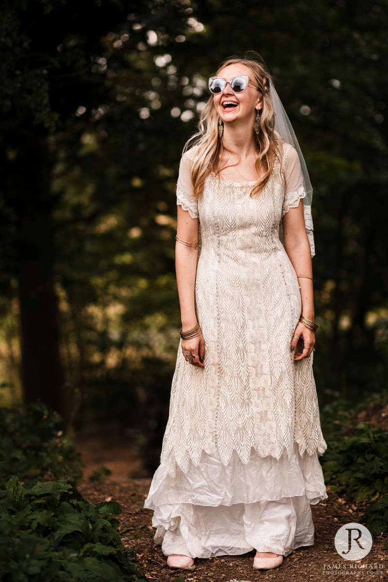 Boho bride laughing