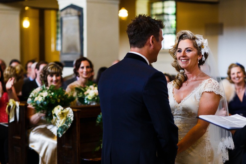 Bride smiles at her groom