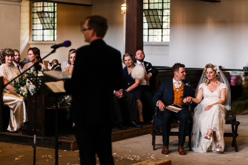 mark and beth looking at each other during their ceremony